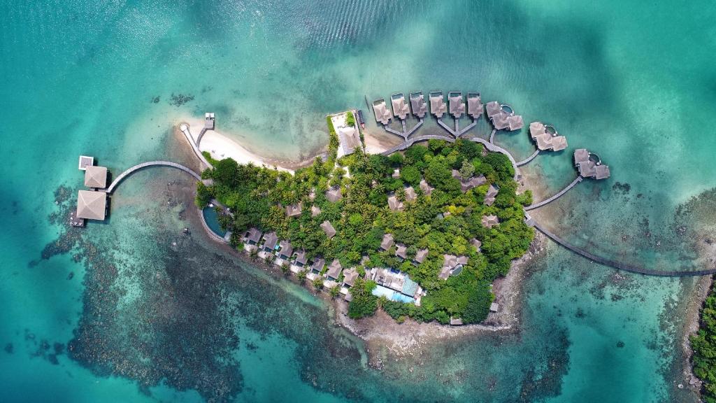 an aerial view of an island in the ocean at Song Saa Private Island in Song Saa Private Island