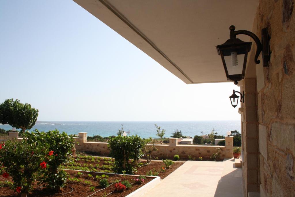 a view of the ocean from a house at Romantica Apartments in Falasarna