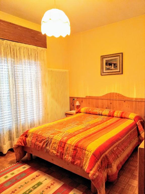 Postel nebo postele na pokoji v ubytování Hotel Zoldana