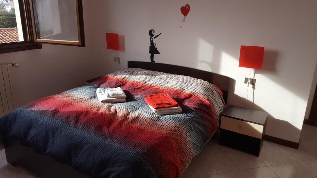 Postel nebo postele na pokoji v ubytování Il Grande Fiume