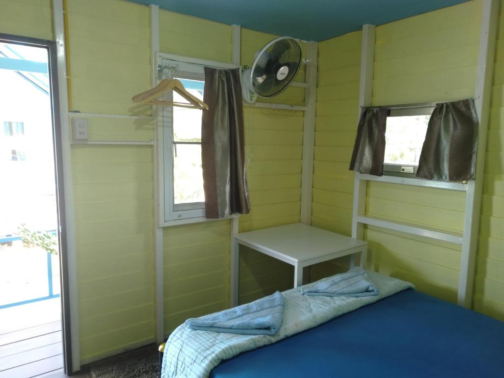 Postel nebo postele na pokoji v ubytování Lakchai Resort