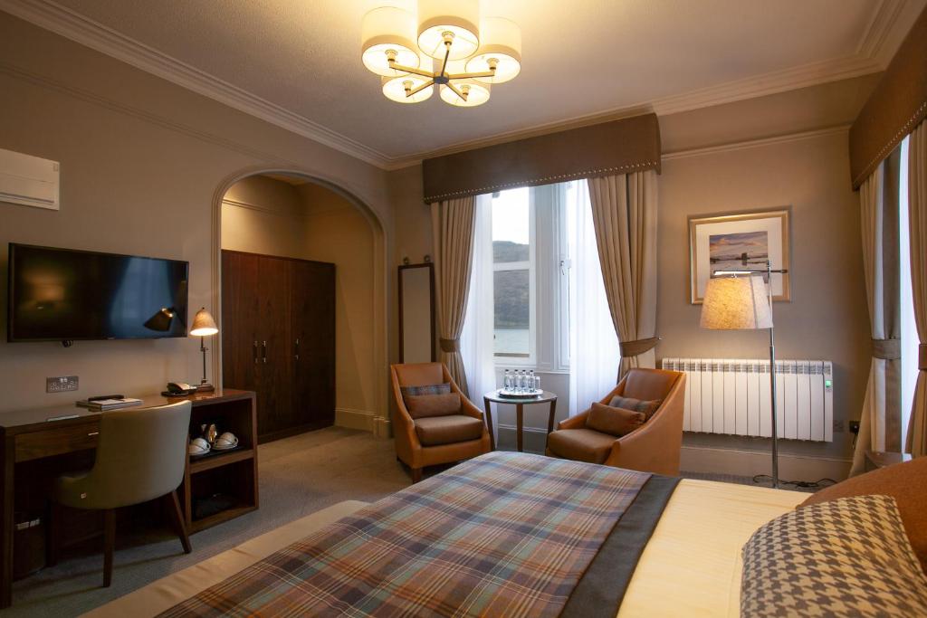 Postel nebo postele na pokoji v ubytování Cruachan Hotel