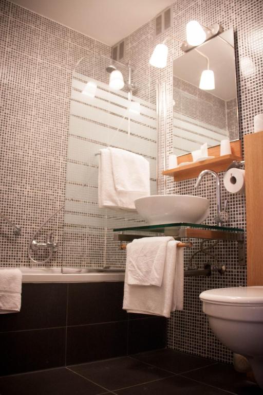 Koupelna v ubytování Hotel Carlton