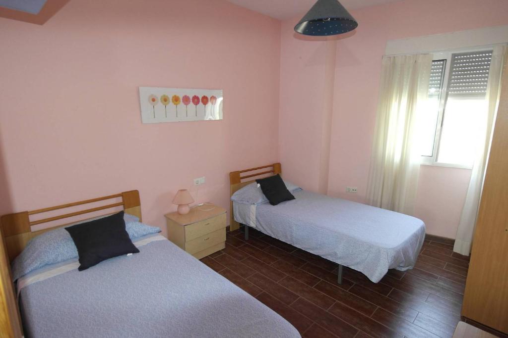 Postel nebo postele na pokoji v ubytování VG1C, Gran apartamento en zona del Puerto