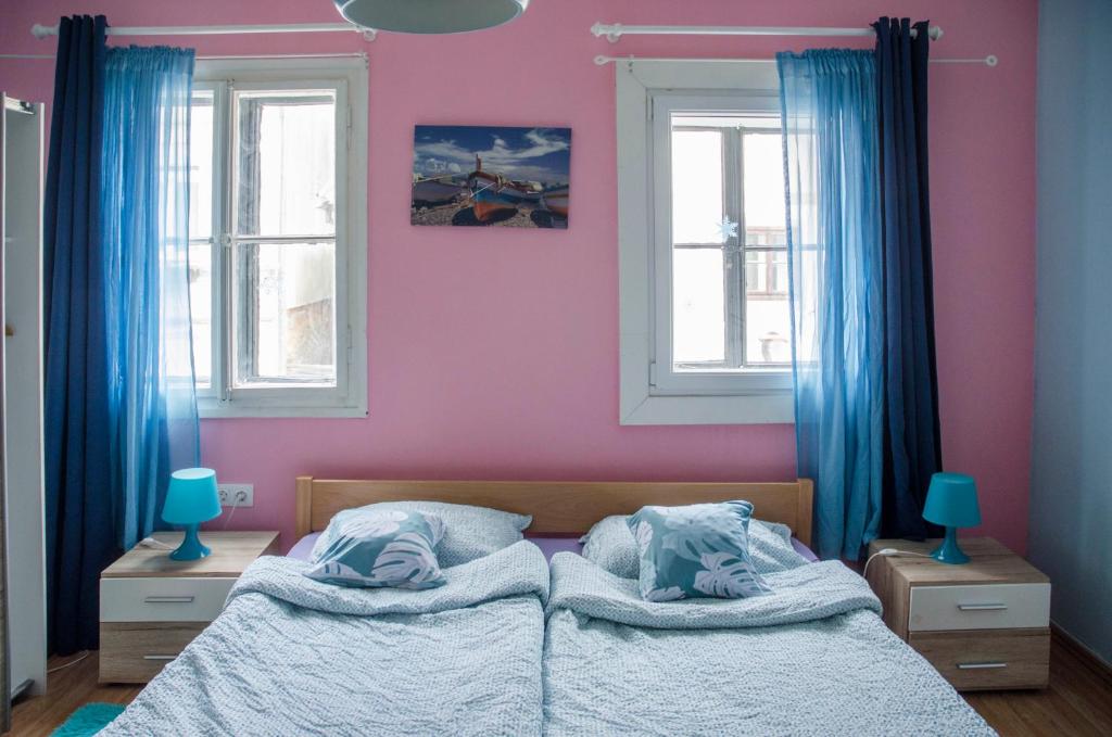 Postel nebo postele na pokoji v ubytování Rooms and Apartment Veral-KA