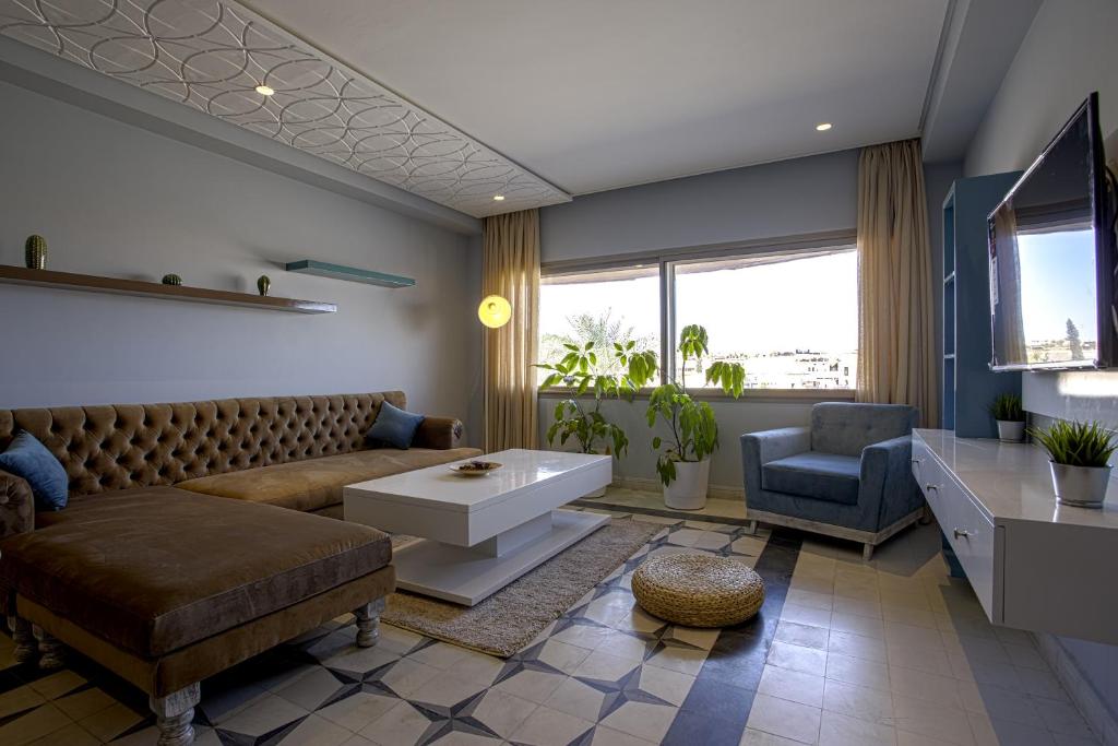 a living room with a couch and a table at BnB MEDINA in Marrakesh