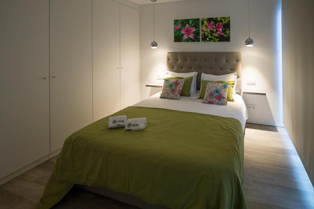 Postel nebo postele na pokoji v ubytování Azaleas Guest House