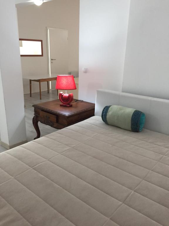 Voodi või voodid majutusasutuse Oro Apartments toas