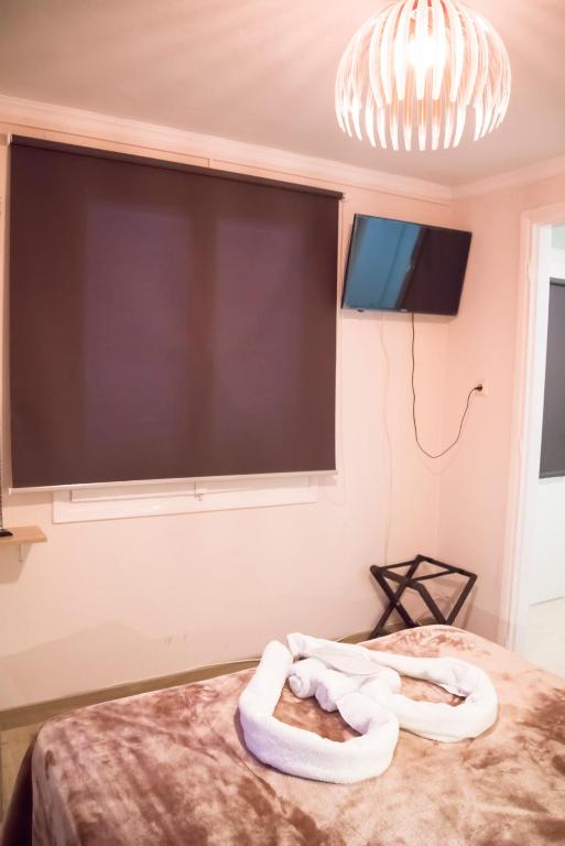 Postel nebo postele na pokoji v ubytování Asimoni Pension