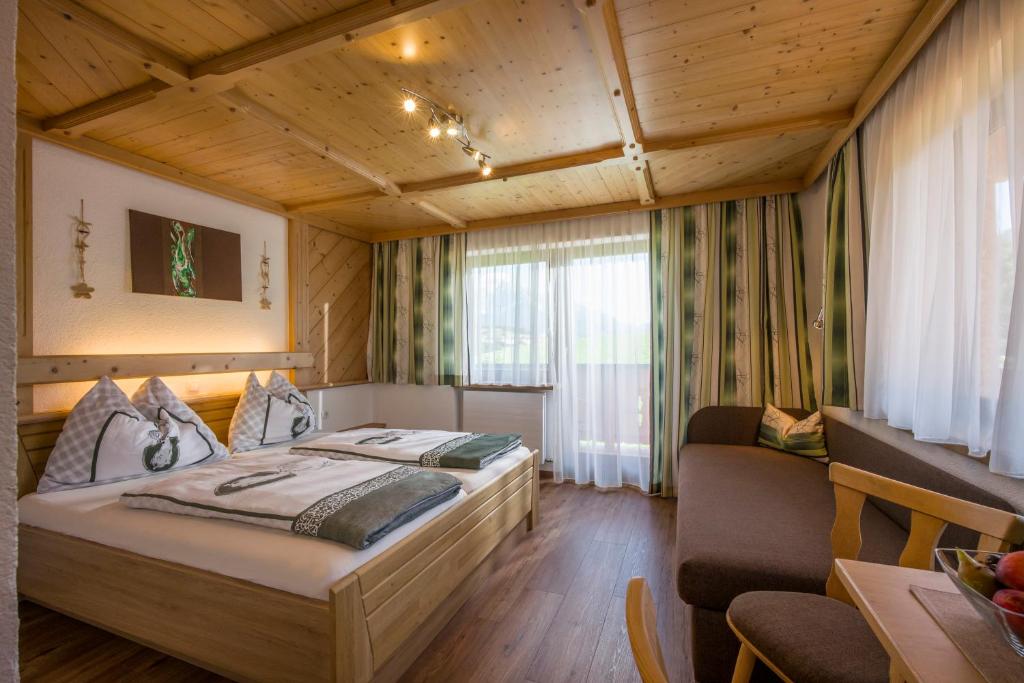Postel nebo postele na pokoji v ubytování Obinghof