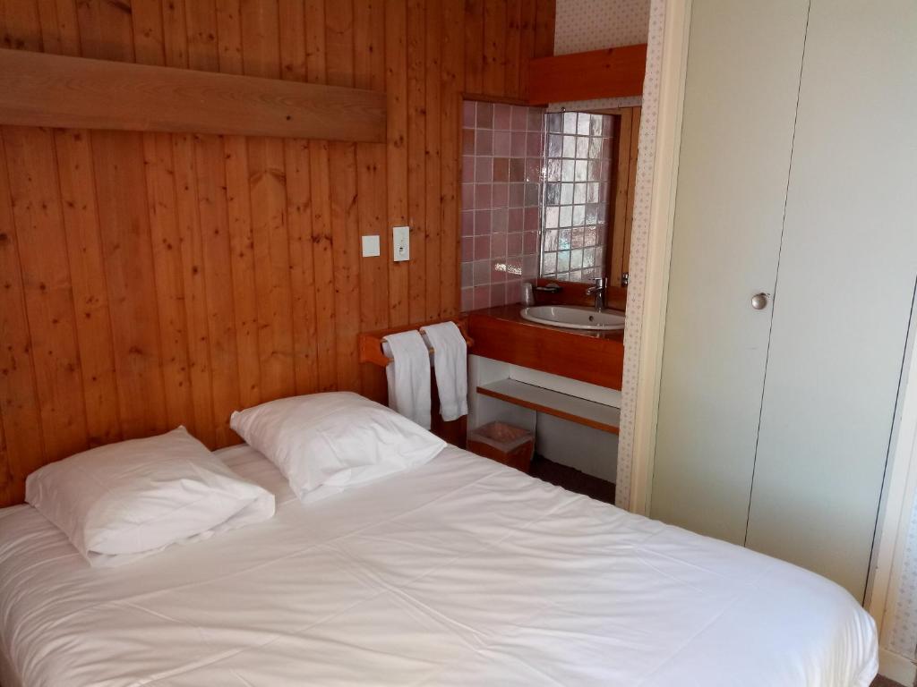 Postel nebo postele na pokoji v ubytování Espace Morteau