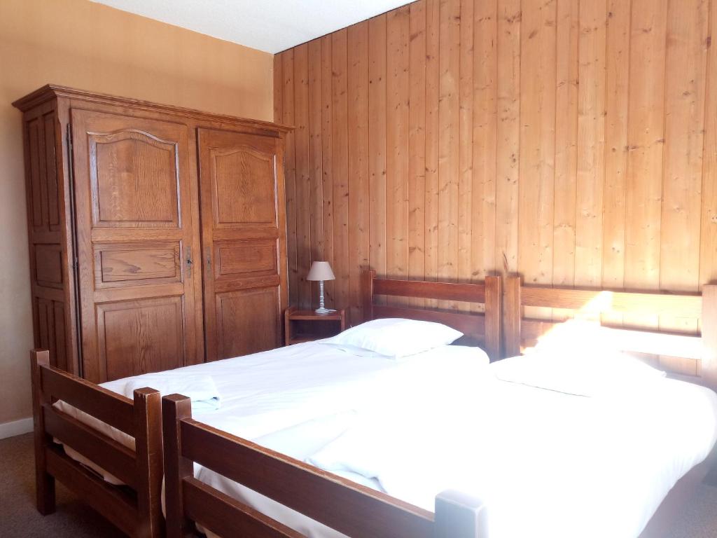 Postel nebo postele na pokoji v ubytování Espace Morteau
