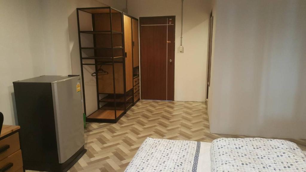 Postel nebo postele na pokoji v ubytování JS mansion