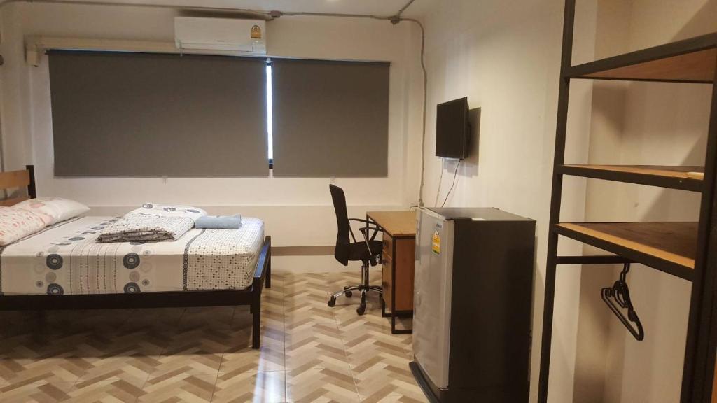 Postel nebo postele na pokoji v ubytování JS mansion