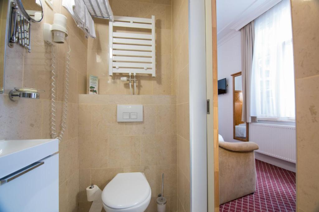 Koupelna v ubytování Hotel The Lord