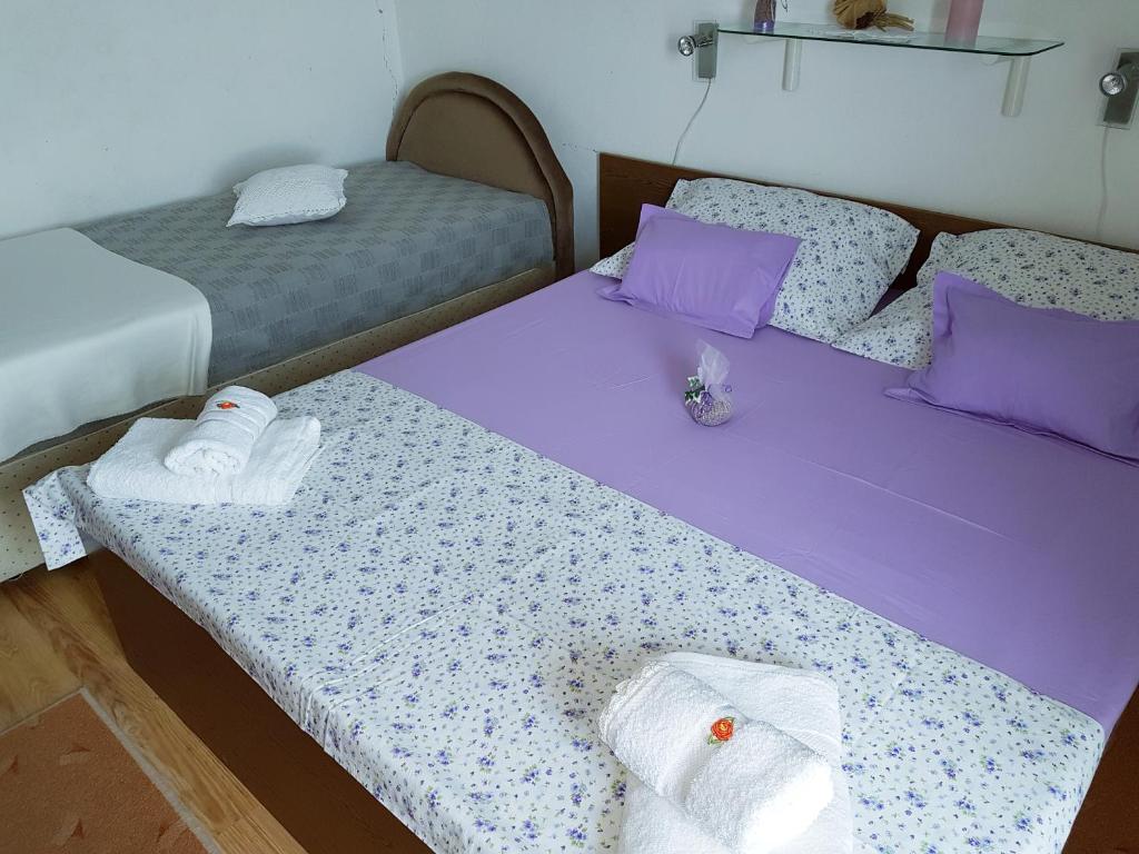Postel nebo postele na pokoji v ubytování Apartman Kristin