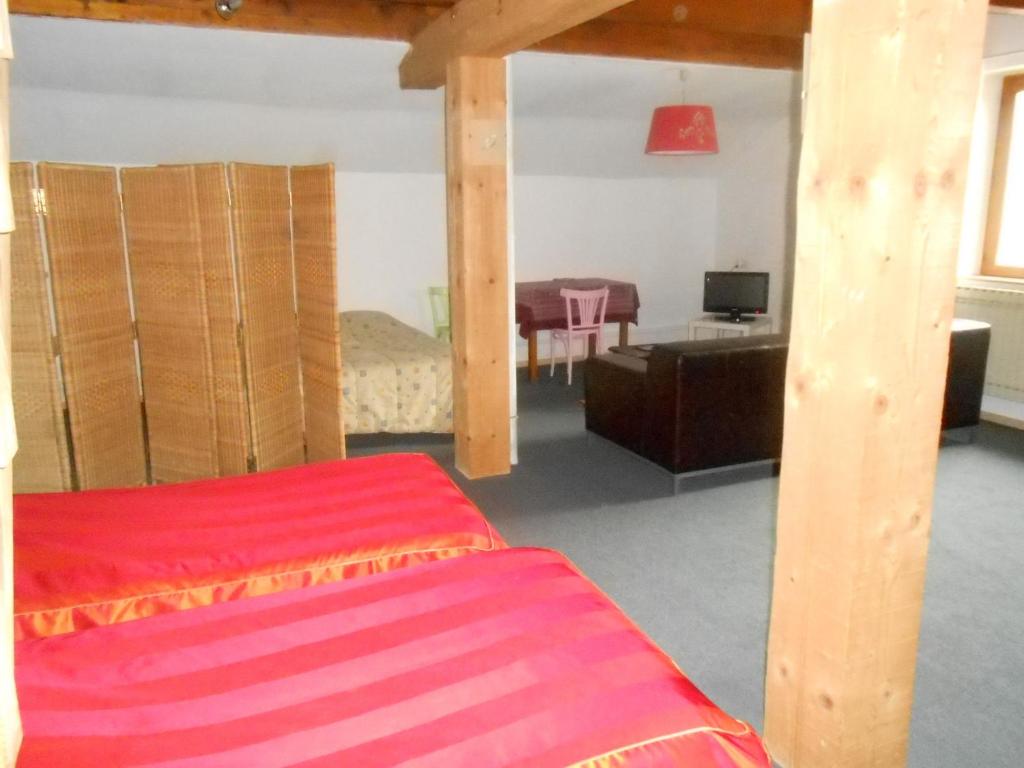 Postel nebo postele na pokoji v ubytování Le Logis du Pré Braheux