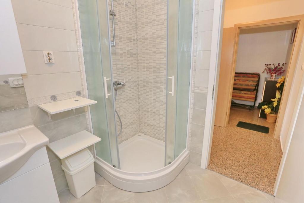 Kúpeľňa v ubytovaní Apartments Romansa