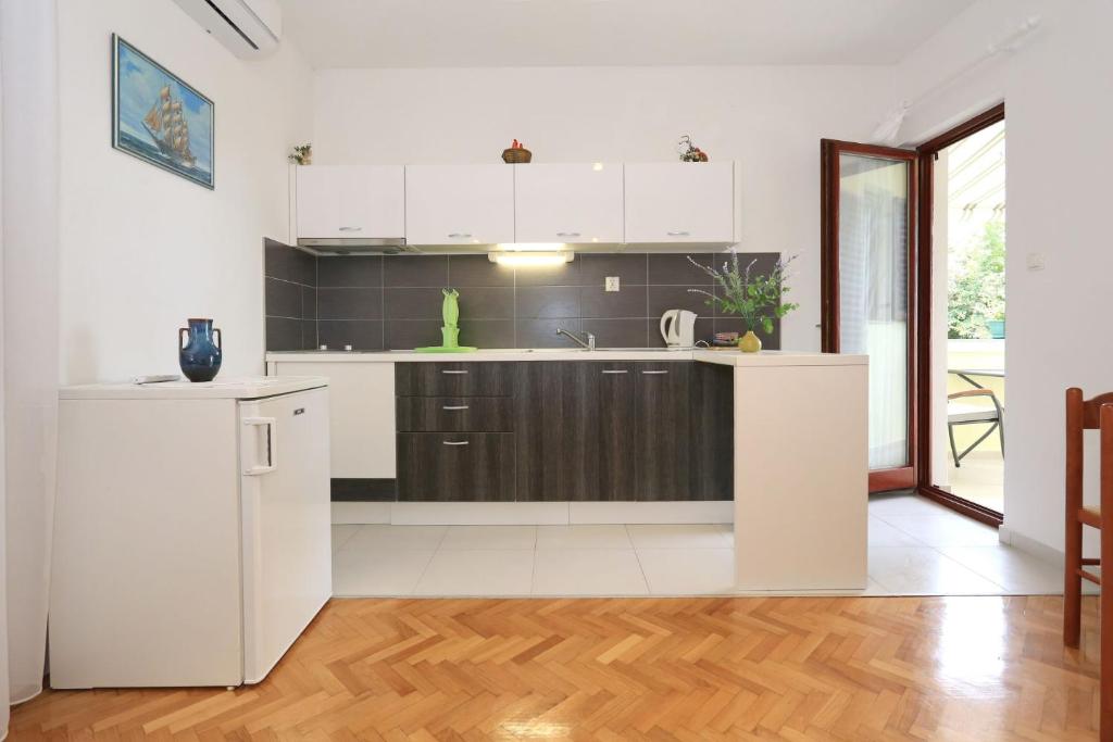 Kuchyňa alebo kuchynka v ubytovaní Apartments Romansa