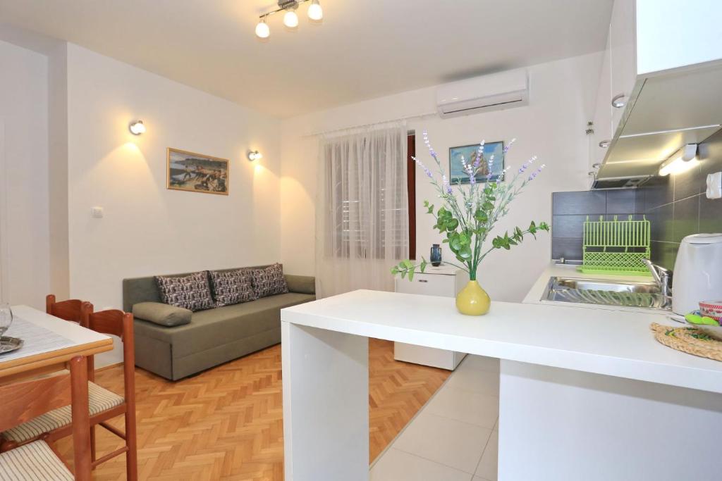 Kuchyňa alebo kuchynka v ubytovaní Apartments Romansa