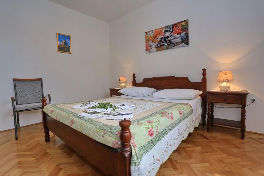 Posteľ alebo postele v izbe v ubytovaní Apartments Romansa