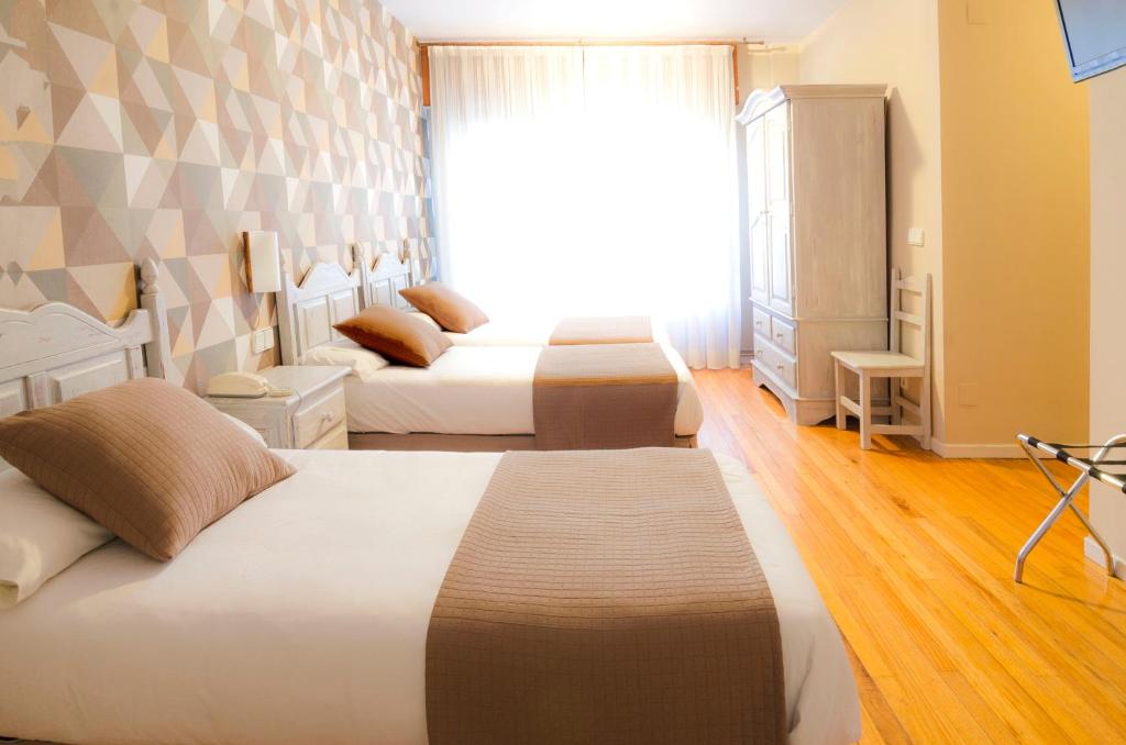 Cama o camas de una habitación en Hotel Arha Potes & Spa
