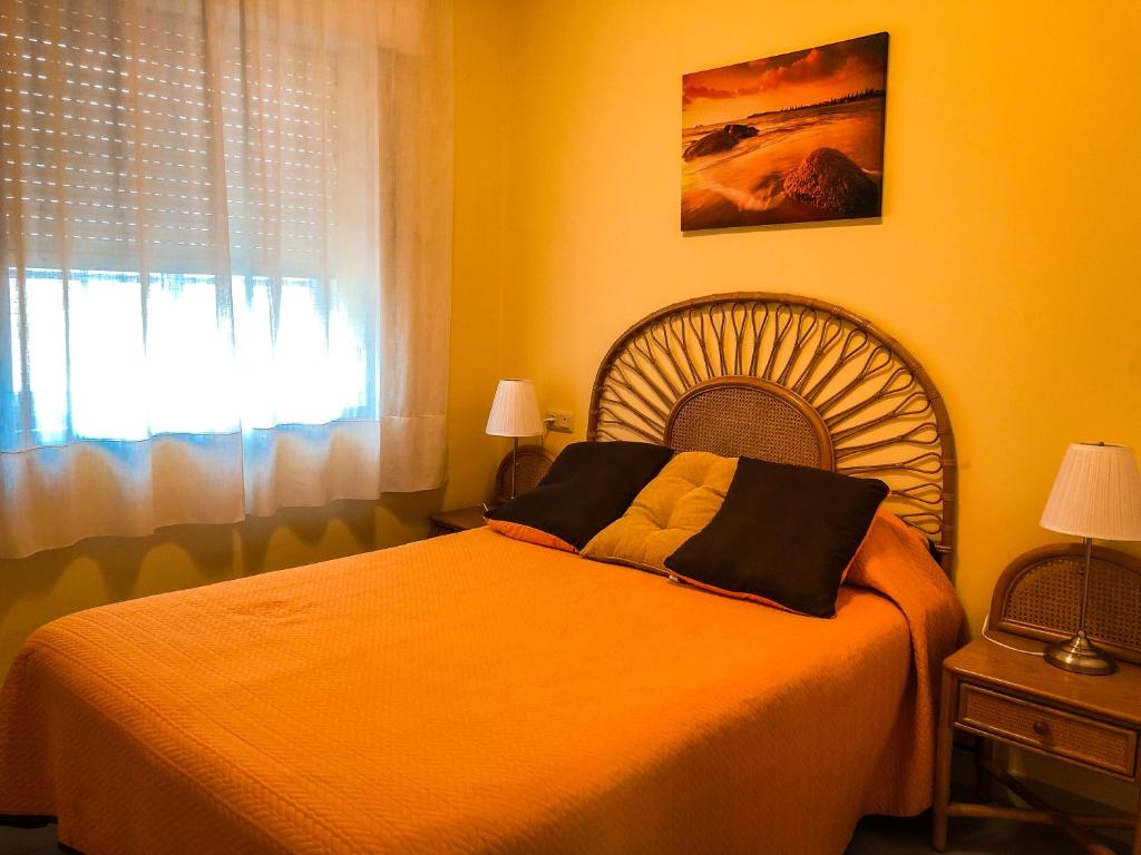 Posteľ alebo postele v izbe v ubytovaní Apartamentos Playa Areas