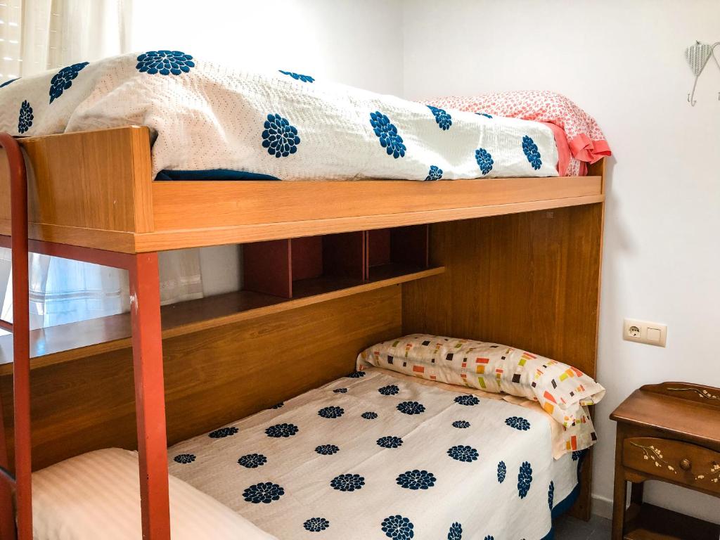 Posteľ alebo postele v izbe v ubytovaní Apartamentos Playa Areas