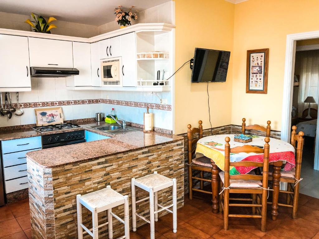 Kuchyňa alebo kuchynka v ubytovaní Apartamentos Playa Areas