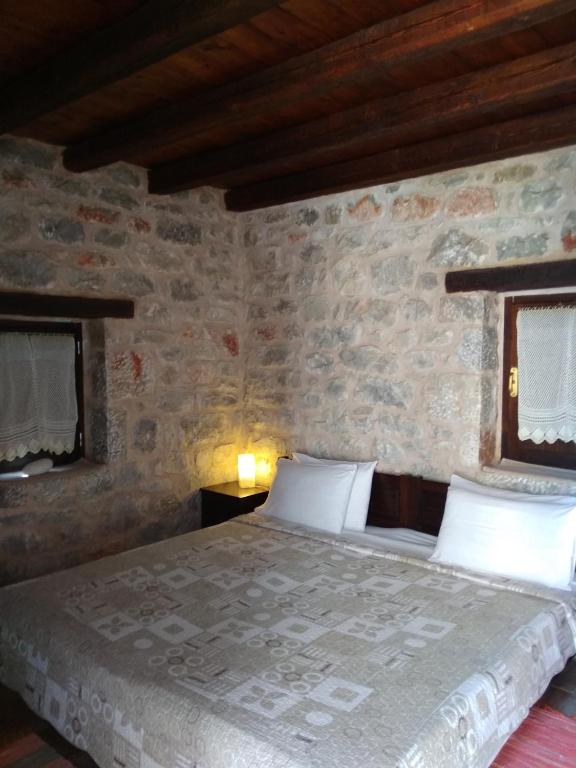 Postel nebo postele na pokoji v ubytování Pirgoi Edem