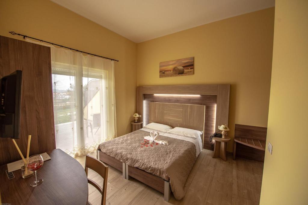 Postel nebo postele na pokoji v ubytování Cataleya Resort & Spa