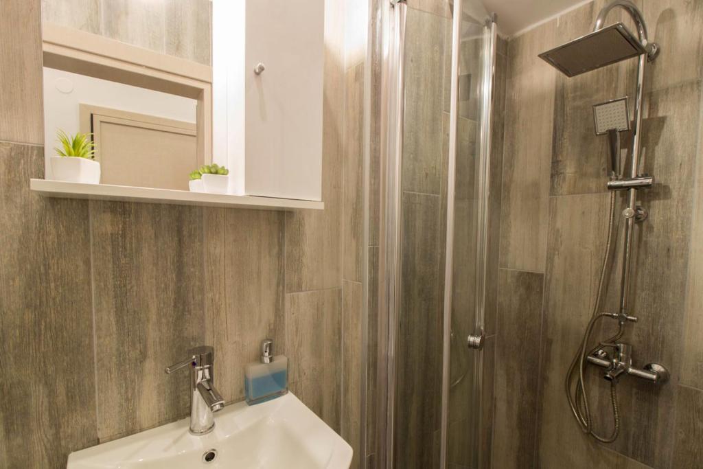Koupelna v ubytování FLOW - White Tower Two Bedroom Suite