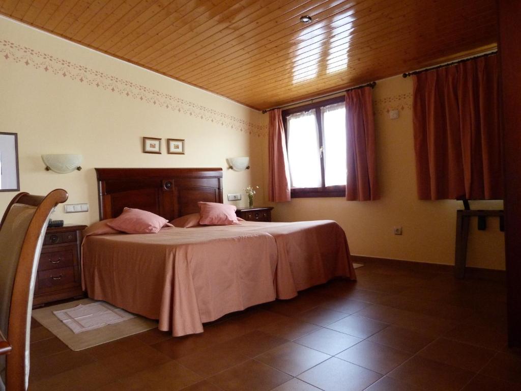 Postel nebo postele na pokoji v ubytování Hotel Esther