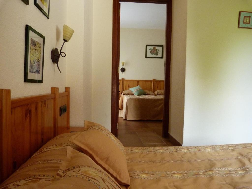 Postel nebo postele na pokoji v ubytování Hotel Esther