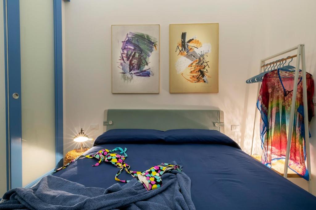 Letto o letti in una camera di Suite&Maré