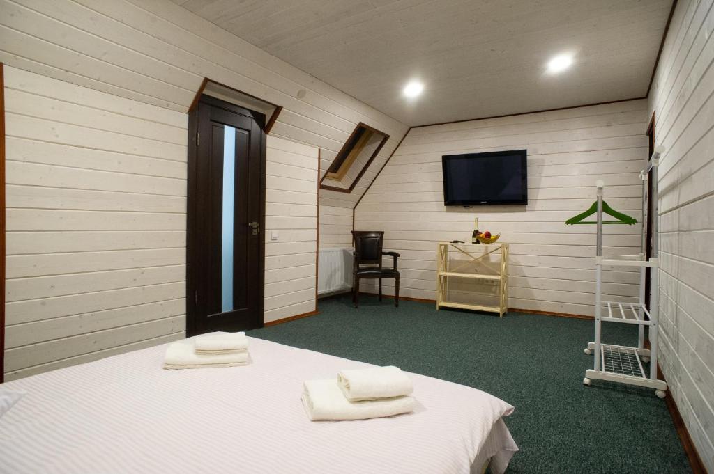 TV a/nebo společenská místnost v ubytování Hotel Galushko