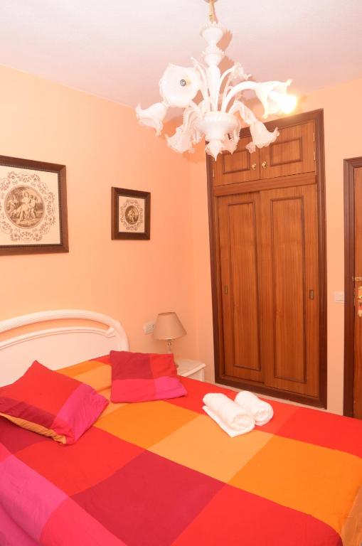 Posteľ alebo postele v izbe v ubytovaní habitacion centro historico malaga