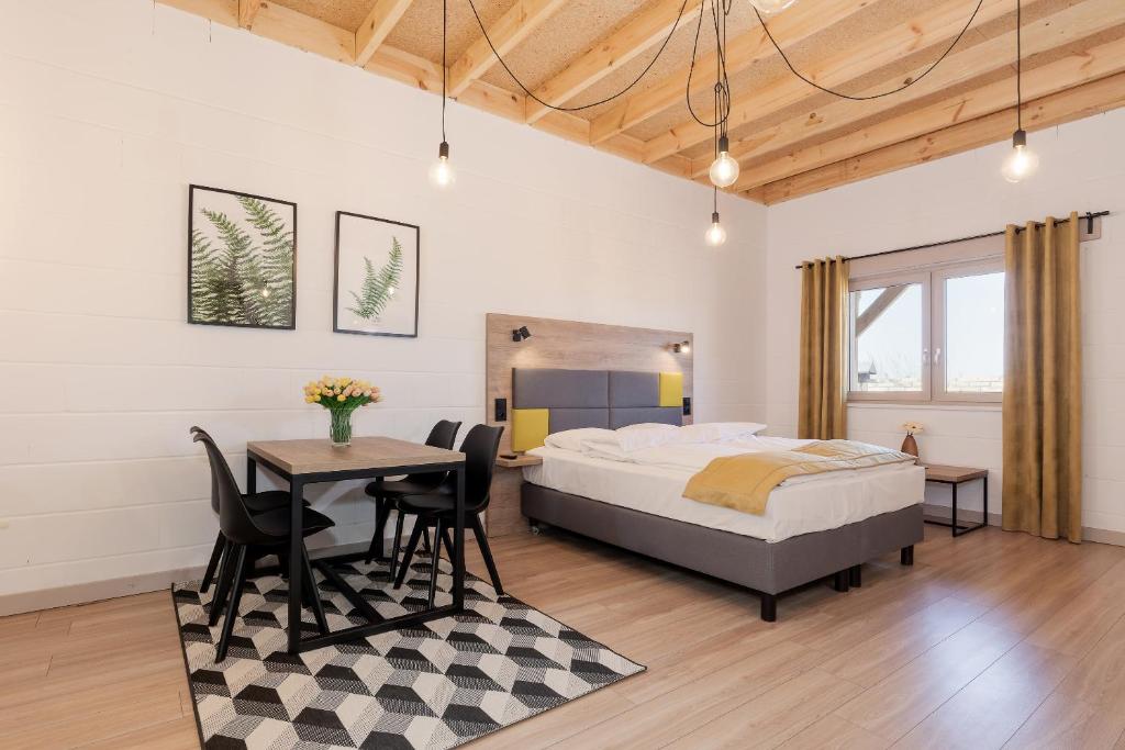 Postel nebo postele na pokoji v ubytování Nowe Sarbinowo