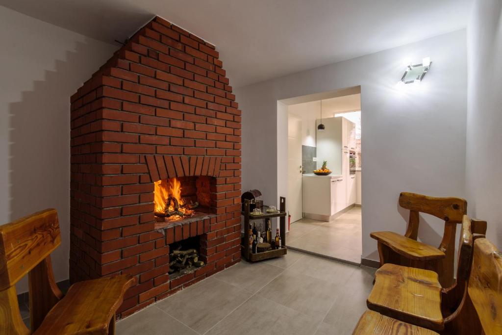 Posedenie v ubytovaní House Niko