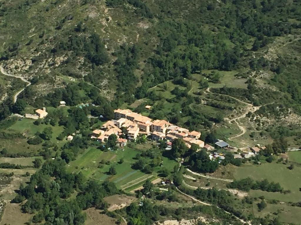 an aerial view of a house on a mountain at La Galisesagnoise in Briançonnet