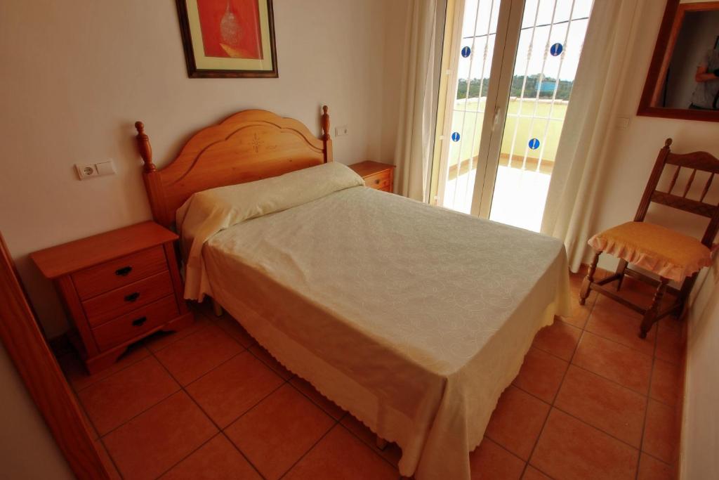 Postel nebo postele na pokoji v ubytování Estrelizia - pretty holiday property with garden and private pool in Calpe