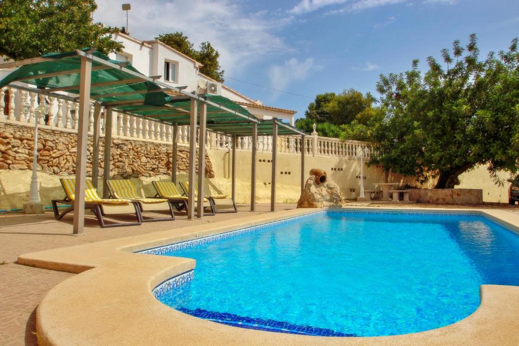 Bazén v ubytování Estrelizia - pretty holiday property with garden and private pool in Calpe nebo v jeho okolí