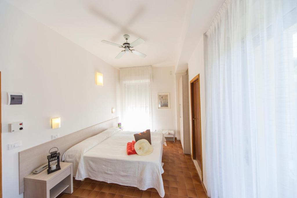 Postel nebo postele na pokoji v ubytování Hotel Adler