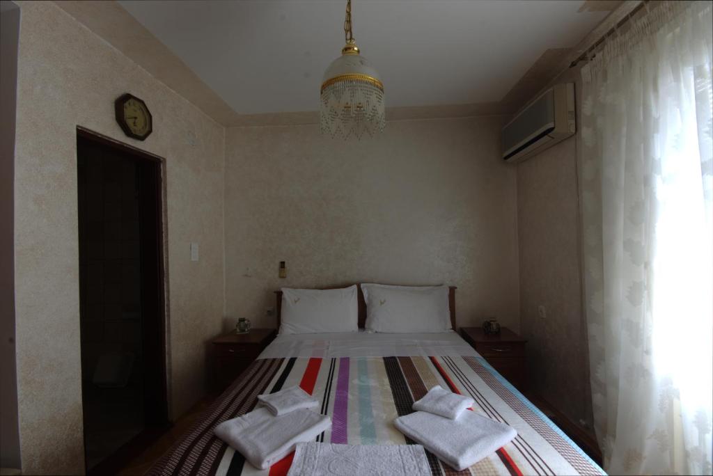 Postel nebo postele na pokoji v ubytování Apartments Astel