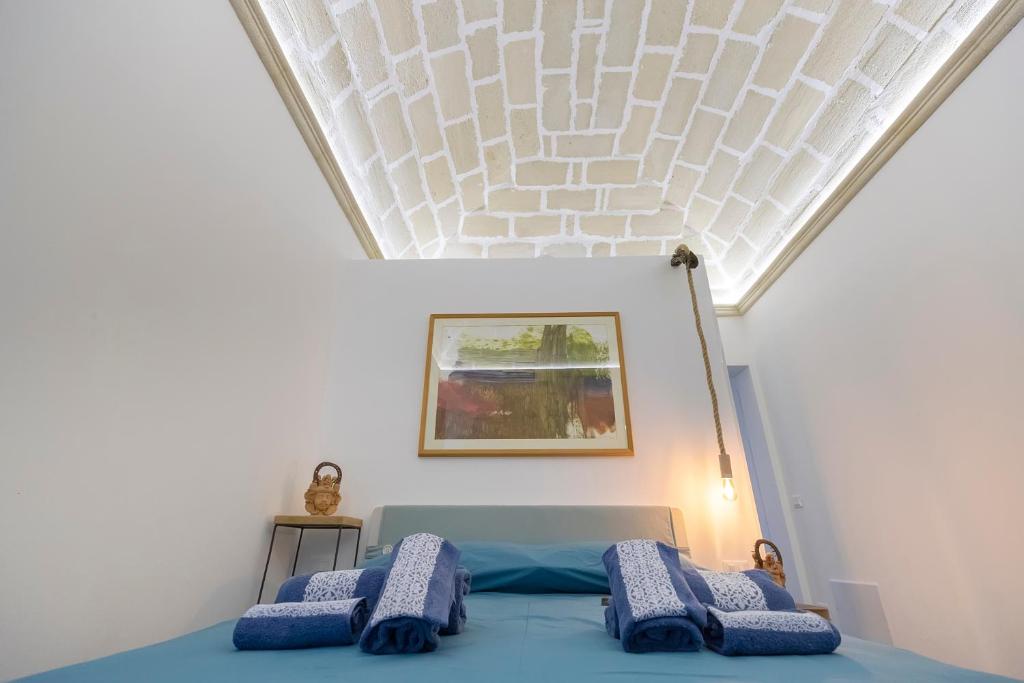 Letto o letti in una camera di Suite&Maré