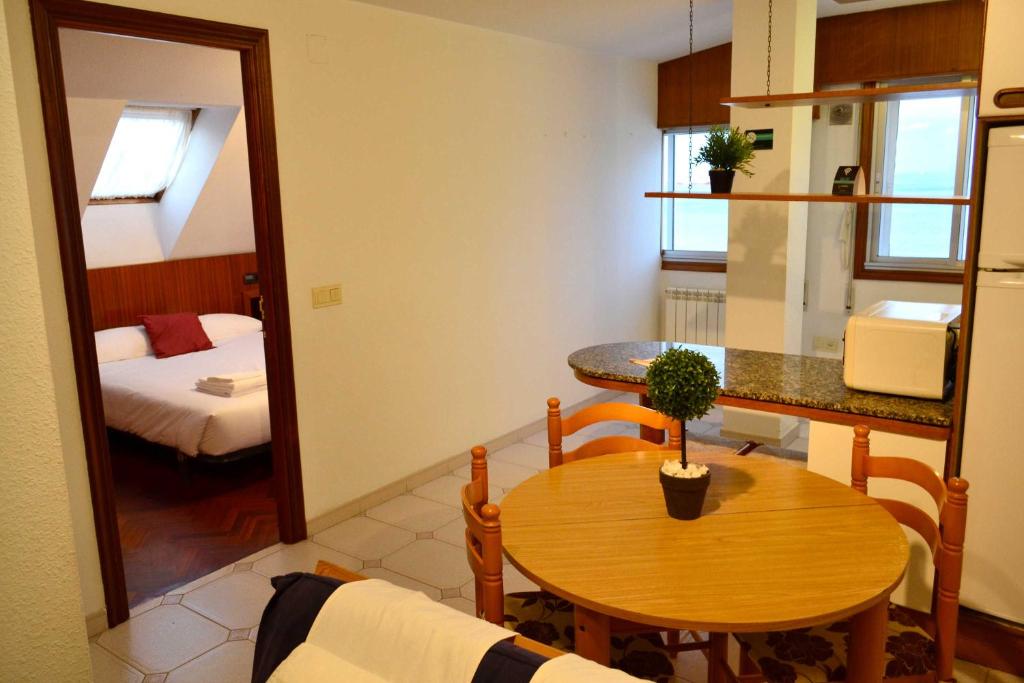 Kuchyň nebo kuchyňský kout v ubytování Apartamentos Alda Santa Cristina