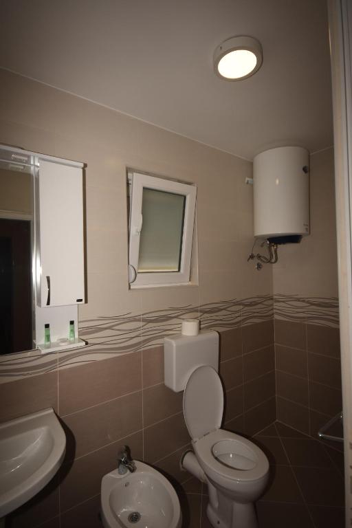 Koupelna v ubytování Apartments Astel