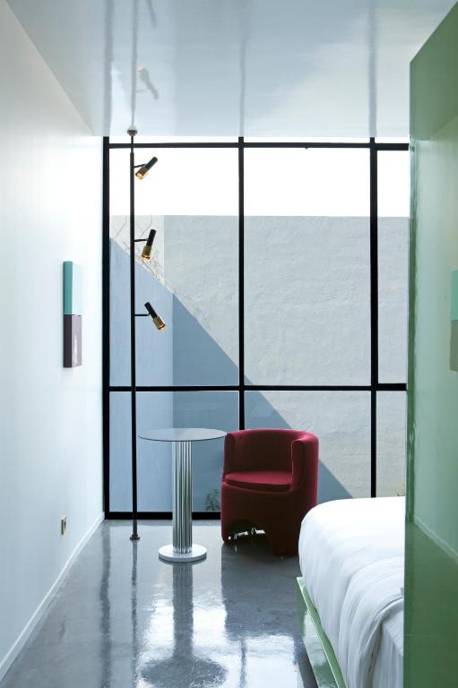 Postel nebo postele na pokoji v ubytování Casa Habita, a Member of Design Hotels