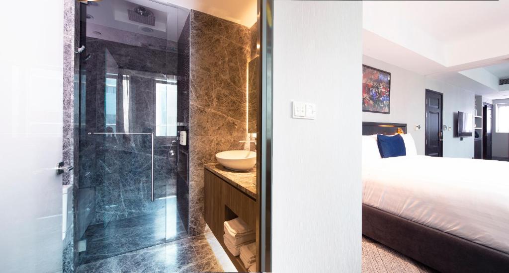 Katil atau katil-katil dalam bilik di Ovolo Central