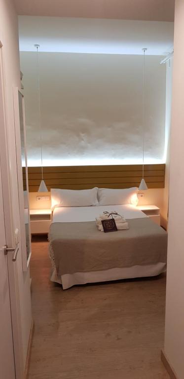 Cama o camas de una habitación en Le Petit Palü-Fuencarral